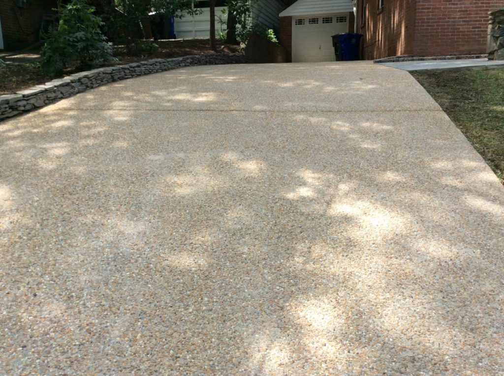 Concrete Driveway with Exposed Pebbles by Capital Masonry