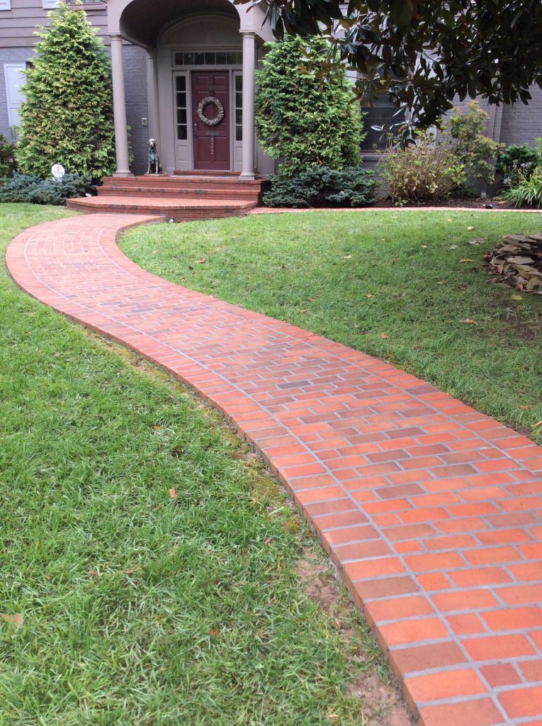 front yard brick path with curves