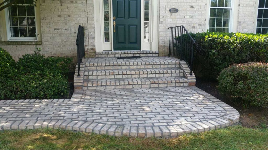 gray brick front porch path and steps