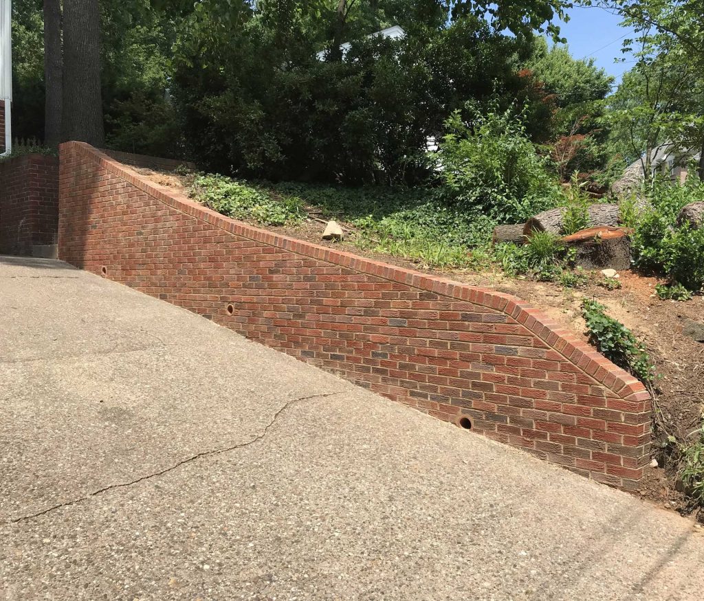 Image of Brick Retaining Wall on Steep Driveway by Capital Masonry