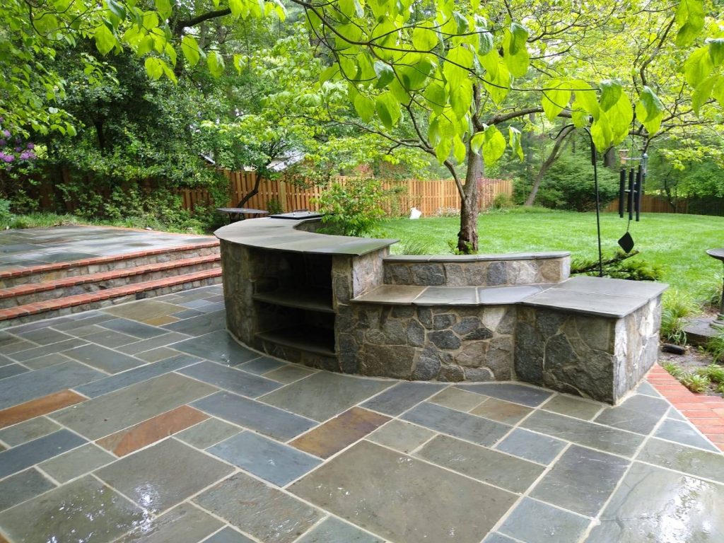 Image of Outdoor Stone Bar with Flagstone Patio by Capital Masonry