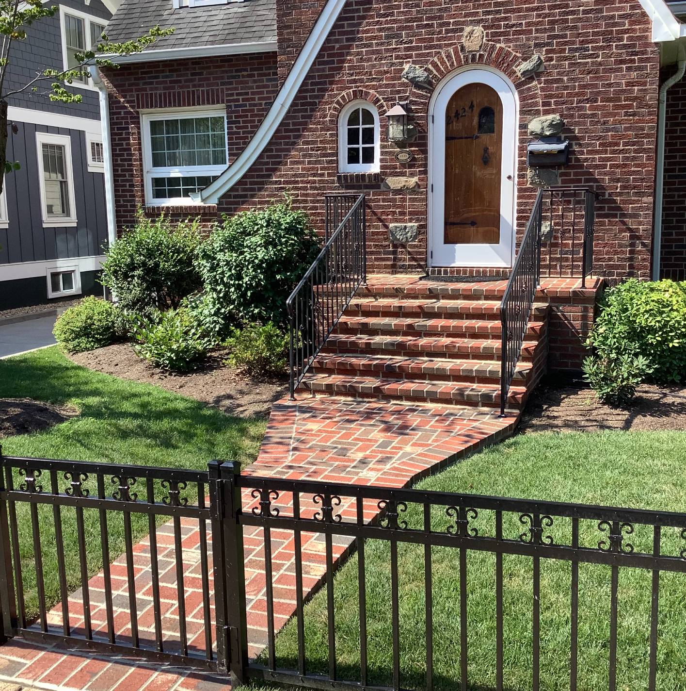 Image of Brick Pathway with Garden Fence and Brick Steps