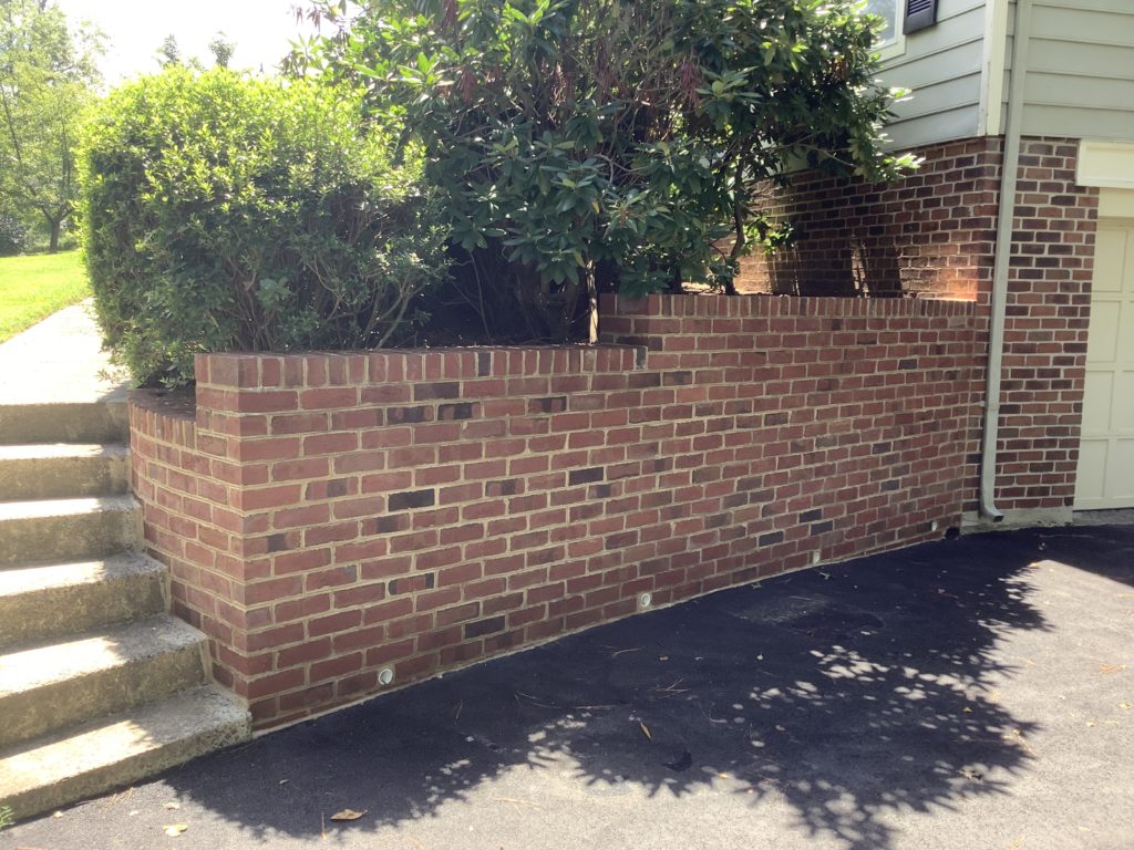Brick Retaining Wall at Driveway and House